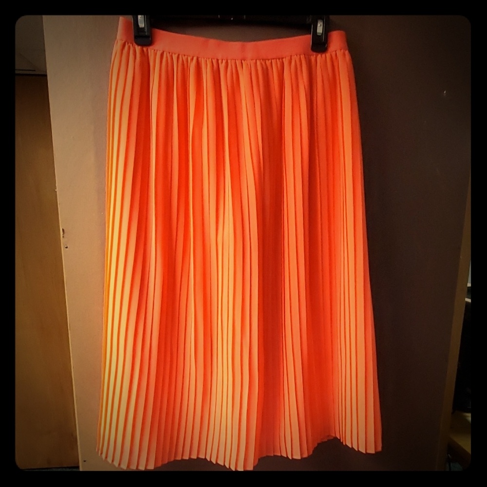 Orange pleated skirt